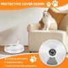 63646cf3a3296496e569a77915903a97 Automated cat feeder with protective cover on carpet, white cat on sofa, modern pet accessory
