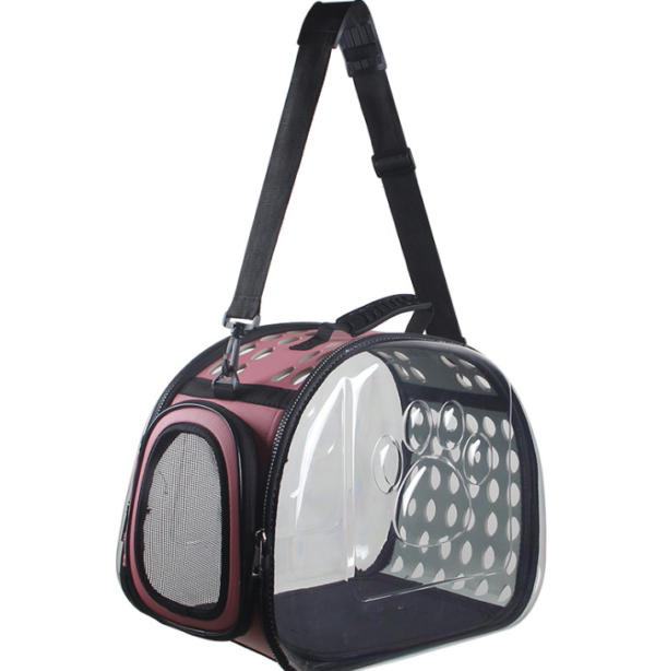 Transparent cat carrier bag with mesh window, paw print design, and adjustable shoulder strap