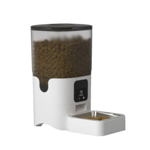 Automatic cat feeder filled with dry cat food, white and black design, with metal bowl