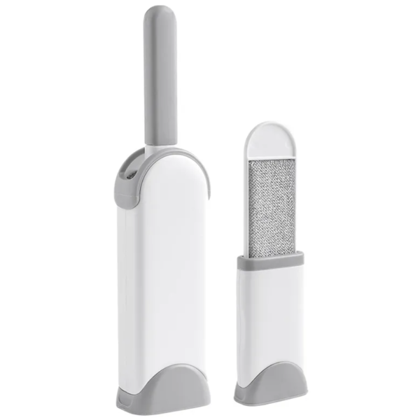 Self-cleaning pet hair remover brush with gray handle and base, shown with case